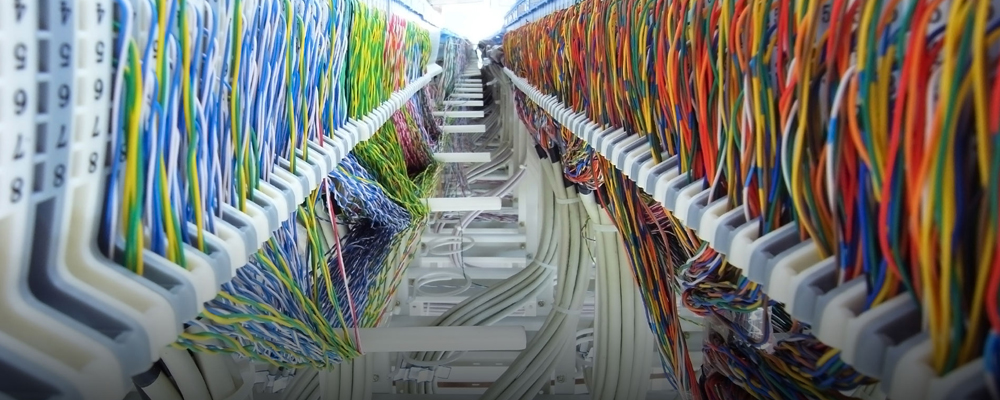 network cables and servers in a technology data centre